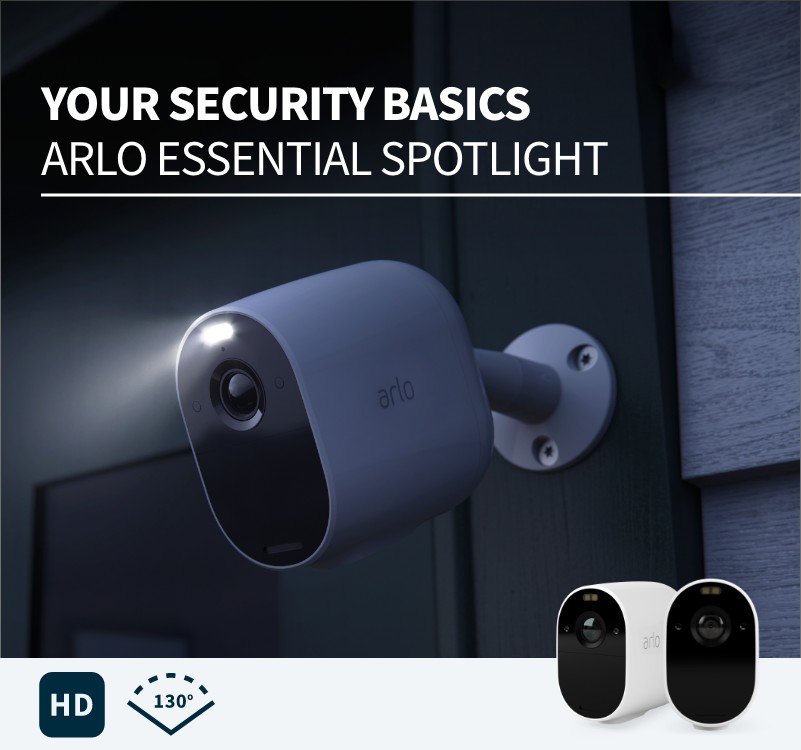 A night-time view of an arlo Essential Spotlight camera attached to a door outside with the spotlight shining. Your security basics headline. HD and 130 degree angle images are displayed.