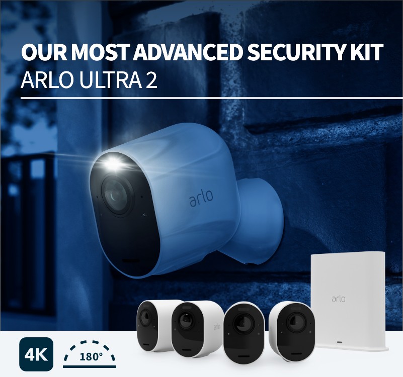 A night-time view of an arlo Ultra 2 camera attached to a wall outside with the spotlight shining. Our most advanced security kit. 4K and 180 degree angle images are displayed.