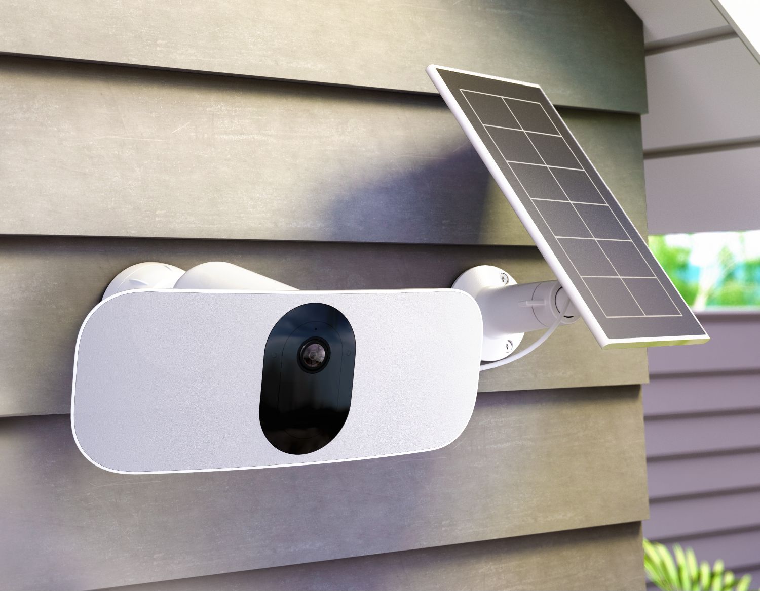 Una telecamera di sicurezza Floodlight abbinata a un pannello solare Arlo è collegata all'esterno con una batteria ricaricabile o un cavo di ricarica per un'alimentazione continua