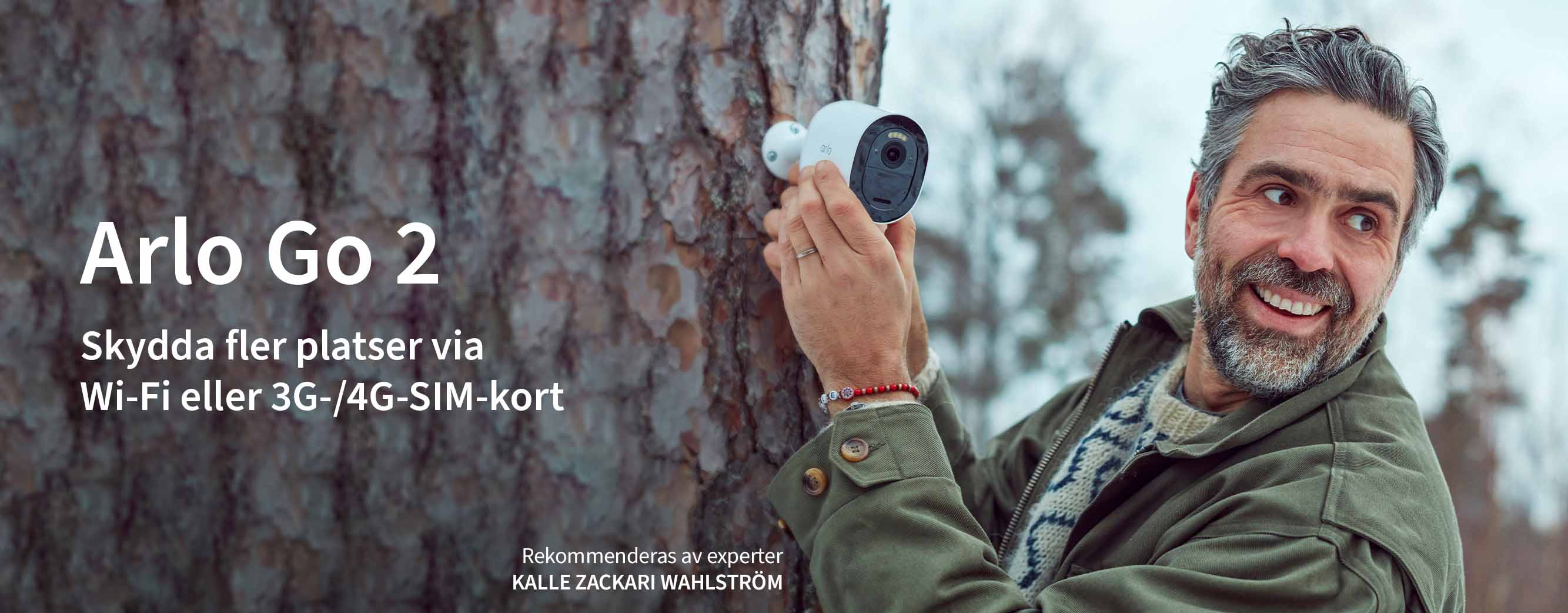 TV-Programledaren Kalle Zackari Wahlström  installerar Arlo Go 2 säkerhetskameran mot en vägg