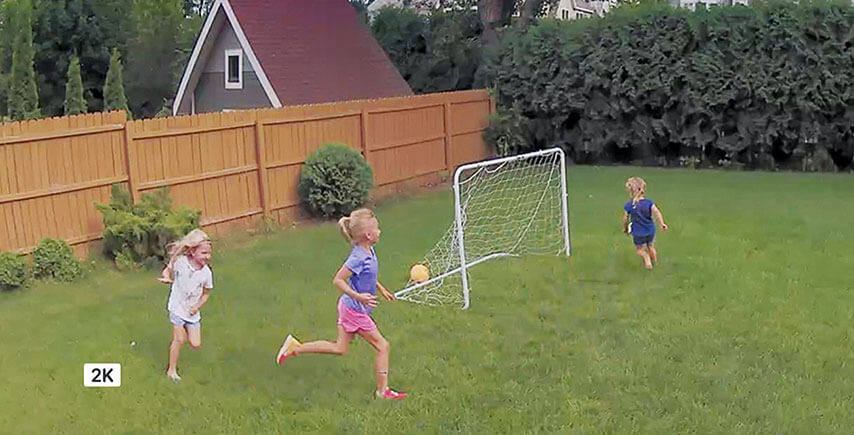 wide view of kids playing soccer