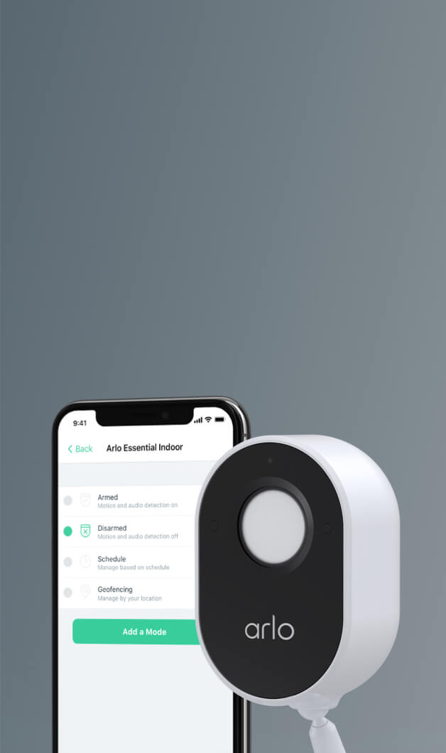 Arlo Essential Indoor Camera and a phone