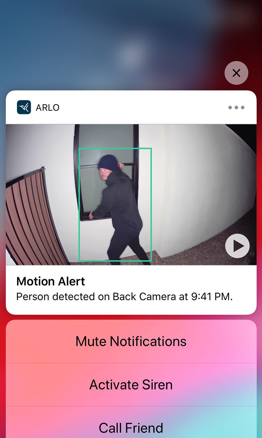 Smart phone displaying Arlo app motion alert detecting motion