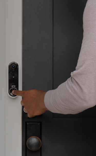 Arlo Video Doorbell Wire-Free displayed on a door