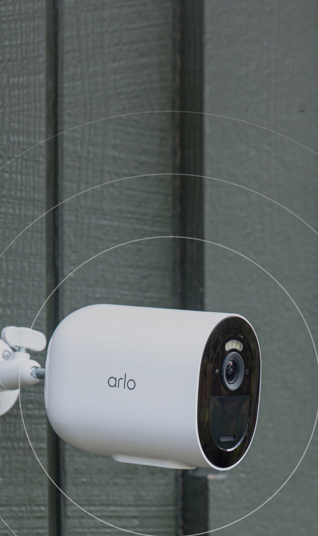 Arlo Go 2 camera mounted on side of shed, with siren warning