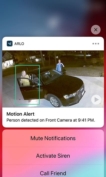 Smart phone displaying Arlo Secure app motion alert detecting motion